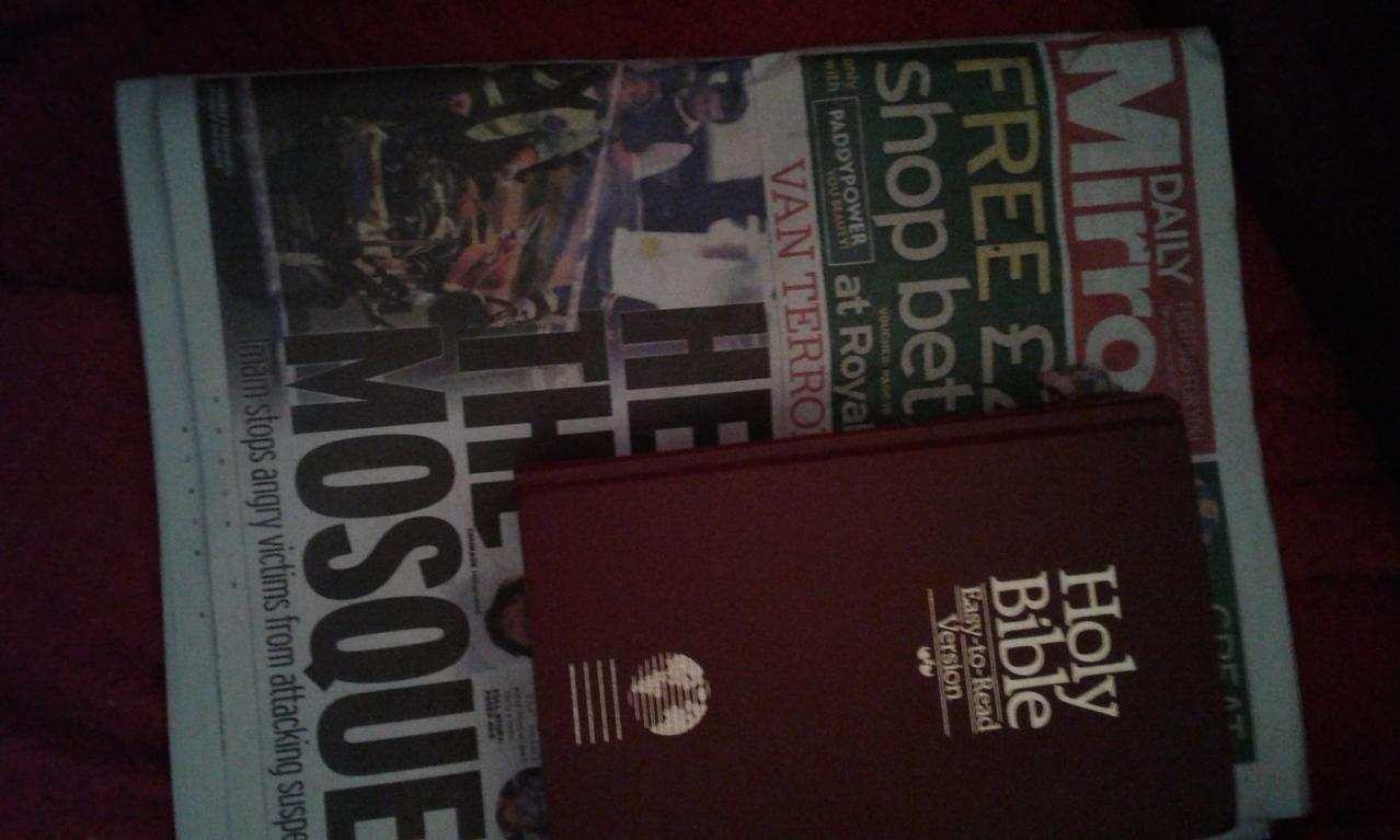 Name:  Bible and newspaper.jpg
Views: 139
Size:  78.8 KB